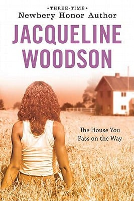 Book cover with a photograph of a girl looking at a house in the distance
